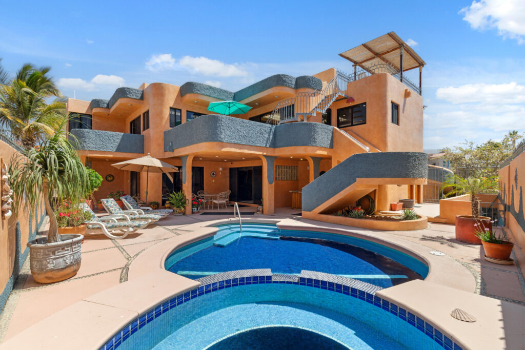 Los Cabos Cabo Bello Casa Blue Fin is a rare DUPLEX investment opportunity in the desirable oceanside community of Cabo Bello. This versatile 4-bedroom, 4-bathroom home offers incredible potential for rental income, full-time or multi-generational living, or both. Each level features 2-bedrooms and 2-bathrooms with private entrances in front and back, making it ideal for generating revenue while maintaining personal privacy or hosting extended family and guests.Enjoy beautiful – 24 Calle Fray Junipero, Cabo Corridor, BS