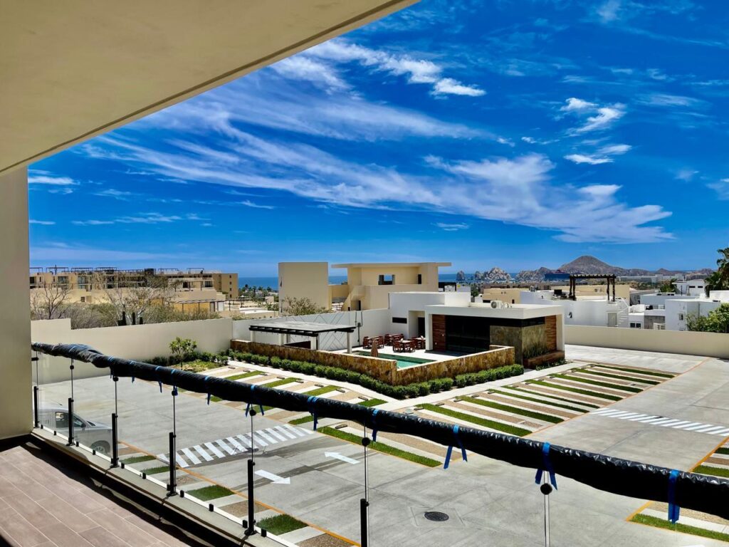 Los Cabos Ladera Phase 1 This beautiful, upgraded Modern-Style two-bedroom, two-bathroom condo comes fully furnished, is tastefully decorated, and features several high-end upgrades, including: Electrical Florida Hurricane shutters with remote control (under warranty), Two underground parking stalls, a private electric car charger, a large storage room. The condo is ideally located just steps away from Palmilla swimmable beach. It is centrally situated across from key amenities such as Picacho McGregor private school, the Fresco supermarket, H+ Hospital, a bank and the Palmilla Shopping Plaza. Community amenities are on the way. PRIVATE PALMILLA DUNES CLUB MEMBERSHIP is included. Upgrades include:-TVs, a/c units, fans-Fully furnished and staged-New washer/dryer-New paint everywhere-Refinished entrance door-Patio set-BBQ-Mosquito nets-Electrical Florida Hurricane shutters with remote control and under warranty-Two parking spots, side by side and covered from the hurricane winds-Private electrical car charger-Large storage room downstairs-All appliances included-Linen curtains-Hot water tank just services-LG fridge-Water filtration system in kitchen – 2nd floor Ocean view, Cabo Corridor, BS