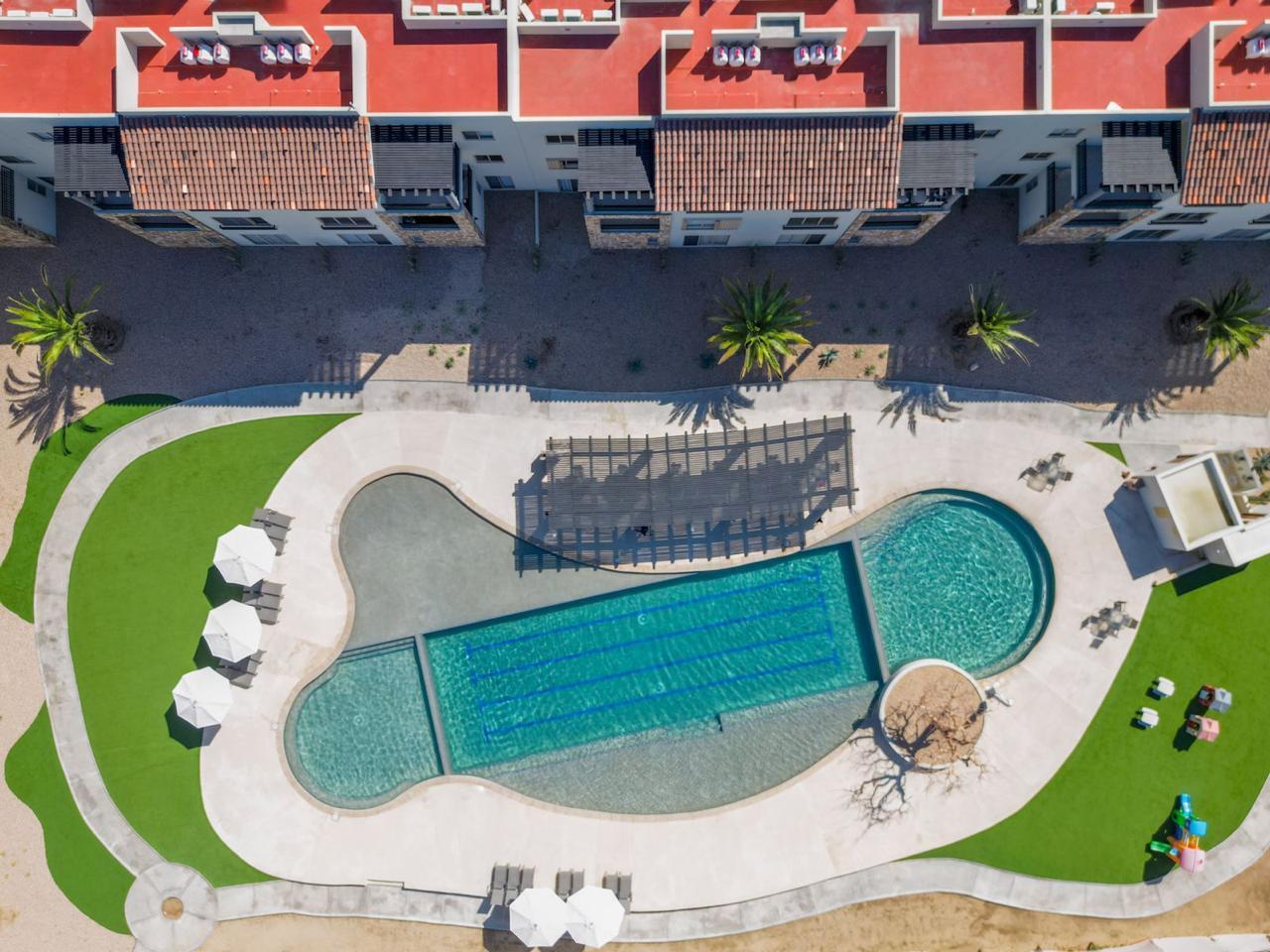 Los Cabos Dunna Welcome to Dunna - A New Standard of Luxury in Cabo. More than a residence, Dunna is a vibrant, fully integrated community where luxury, culture, and recreation converge. Designed by renowned architect Sordo Madaleno, this visionary development seamlessly blends timeless elegance with natural tranquility, offering meticulously crafted residences and garden villas complemented by world-class amenities. Elevated Living, Unmatched Experiences Choose from 13 thoughtfully designed floor plans from 2 - 5 bedrooms ranging from 1,475 - 6,458 sq. ft., featuring seamless indoor-outdoor living, elegant finishes, private rooftops, Jacuzzis, and lush garden terraces. Resort-Style AmenitiesEnjoy unparalleled amenities, including:" Infinity pools (Adults-only, Family, Kids & Oasis)" State-of-the-art wellness & fitness center" Luxury spa (sauna, steam, ice baths, massage suites)" Exclusive rooftop lounges & panoramic for sale