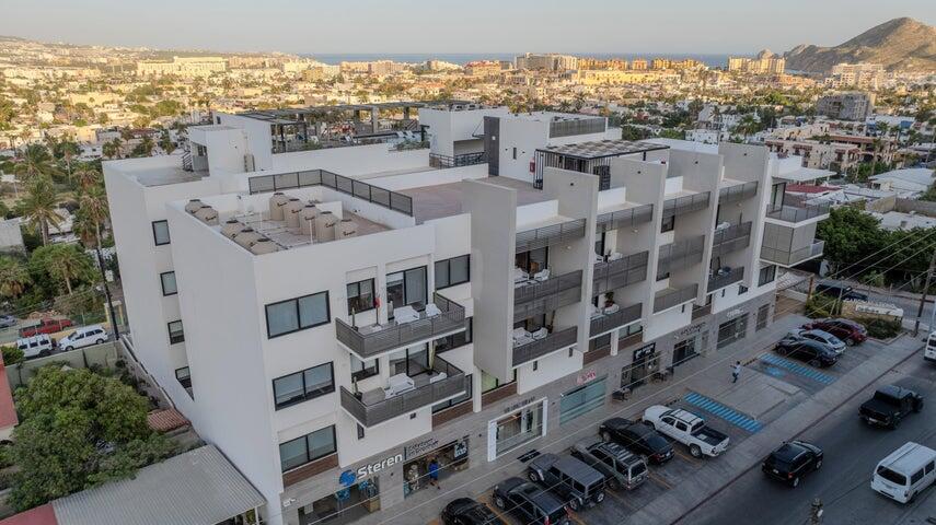 Los Cabos Club La Costa This beautiful corner Penthouse is located in the highly desirable Club La Costa Phase 3 community and comes fully furnished. its prime location allow you to walk to the beach, supermarket, and a variety of restaurants all just steps away. The main floor features two full bathrooms and an open -plan living and dining area with a modern kitchen. Large sliding doors lead to a spacious terrace overlooking the golf course, perfect for relaxing or entertaining. A convenient storage room is also located on this level. Upstairs, you'll find two generously sized bedrooms and two full bathrooms. The master suite includes a large private terrace with stunning golf course for sale