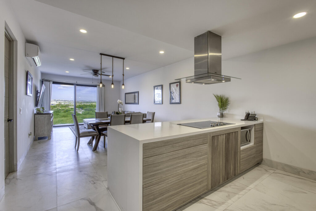 Los Cabos Costarena Welcome to Costarena Boutique Residences. Located in the exclusive community of Club Campestre San Jose, this collection of 39 resort-style condominiums is the epitome of understated elegance. A private community meticulously designed by renowned Mexican architects Carranza/Ruiz to offer an elevated lifestyle. Intimately scaled at seven three-story towers over two and a half acres, the vision of these homes is rooted in the natural world and seamlessly integrates indoor-outdoor living. Enjoy the tranquility and beauty of luxury coastal living with convenient proximity to all San Jose has to offer. Effortless style is in every detail of this meticulously designed three-bedroom three full bathroom residence. A perfect expression of understated elegance in over 1964 square feet of indoor-outdoor living space. Unobstructed – Amaterra, Cabo Corridor, Cabo Corridor, BS