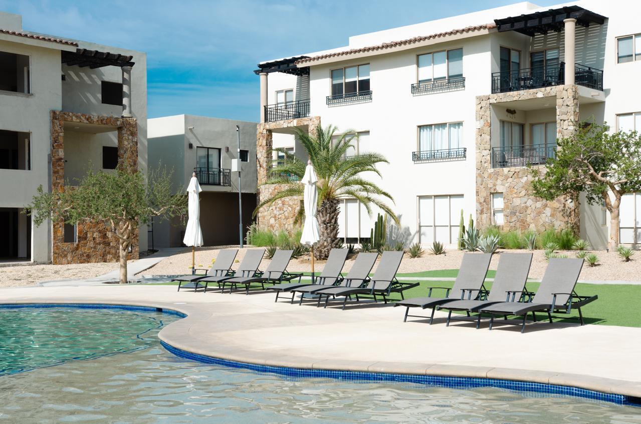 Los Cabos Veranda Residences Modern condominium located in Veranda, a quiet and well-designed community in Cabo San Lucas. This residence offers a comfortable layout perfect for relaxing and enjoying the Baja lifestyle.It features two bedrooms, two full bathrooms, and an open-concept living area that seamlessly integrates the kitchen, dining, and living spaces, creating a bright and inviting atmosphere. The condo is offered fully furnished, allowing you to move in and enjoy it right away. Veranda is a low-density community with only 18 units, offering privacy, tranquility, and a more exclusive residential feel. The development has fully paved access and is conveniently located near the Transpeninsular Highway, providing quick and easy connections to shops, schools, supermarkets, and all main areas of Cabo.Built in 2022, the unit feels contemporary and fresh. Veranda offers controlled access and well-maintained common areas, making it an excellent option for both living and investing in Cabo. for sale