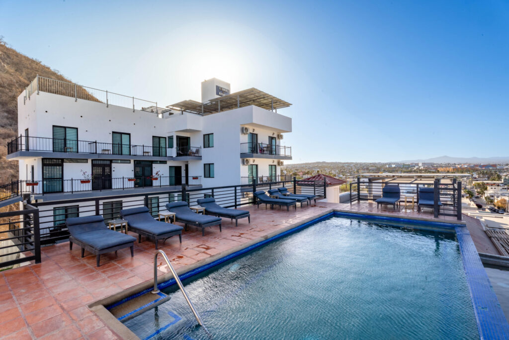 Los Cabos Dunna Welcome to Dunna - A New Standard of Luxury in Cabo. More than a residence, Dunna is a vibrant, fully integrated community where luxury, culture, and recreation converge. Designed by renowned architect Sordo Madaleno, this visionary development seamlessly blends timeless elegance with natural tranquility, offering meticulously crafted residences and garden villas complemented by world-class amenities. Elevated Living, Unmatched Experiences Choose from 13 thoughtfully designed floor plans from 2 - 5 bedrooms ranging from 1,475 - 6,458 sq. ft., featuring seamless indoor-outdoor living, elegant finishes, private rooftops, Jacuzzis, and lush garden terraces. Resort-Style AmenitiesEnjoy unparalleled amenities, including:" Infinity pools (Adults-only, Family, Kids & Oasis)" State-of-the-art wellness & fitness center" Luxury spa (sauna, steam, ice baths, massage suites)" Exclusive rooftop lounges & panoramic – Morgan Residences, Cabo San Lucas, Cabo San Lucas, BS