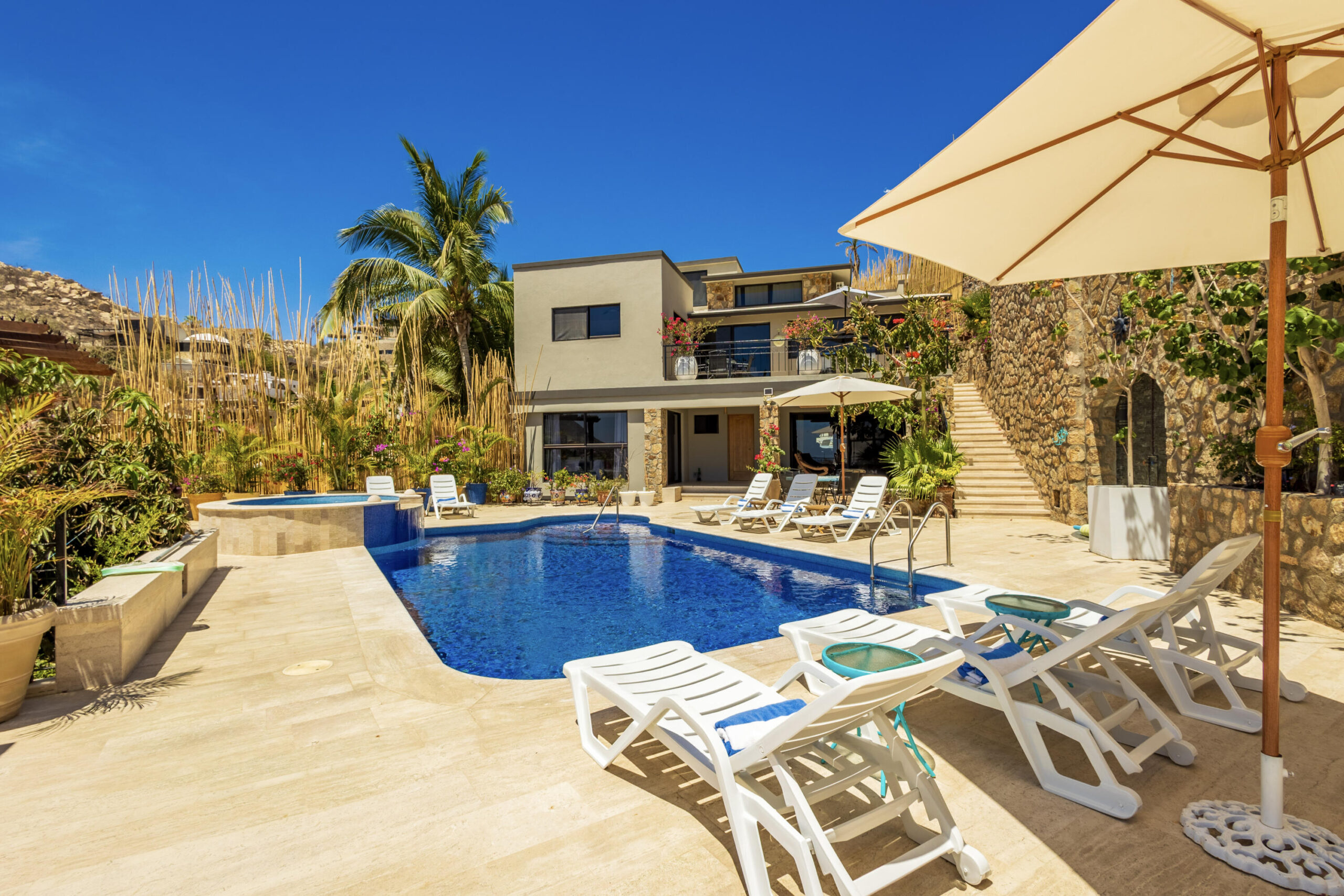 Los Cabos Palmilla Estates Discover a standout investment opportunity in coveted Palmilla Estates, where relaxed coastal style meets refined comfort. This single-story 3-bedroom, 3-bath home blends natural stone, warm wood beams, and a gourmet kitchen with high-end appliances, breakfast nook, and full bar. A generous entry courtyard opens to a heated pool, jacuzzi, outdoor kitchen, and a sun-washed yard overlooking the 9th fairway of the Jack Nicklaus Mountain Course. Eligible for a golf membership, it also makes an effortless vacation retreat with close access to Palmilla Beach, world-class amenities, and the charming San José town center. for sale