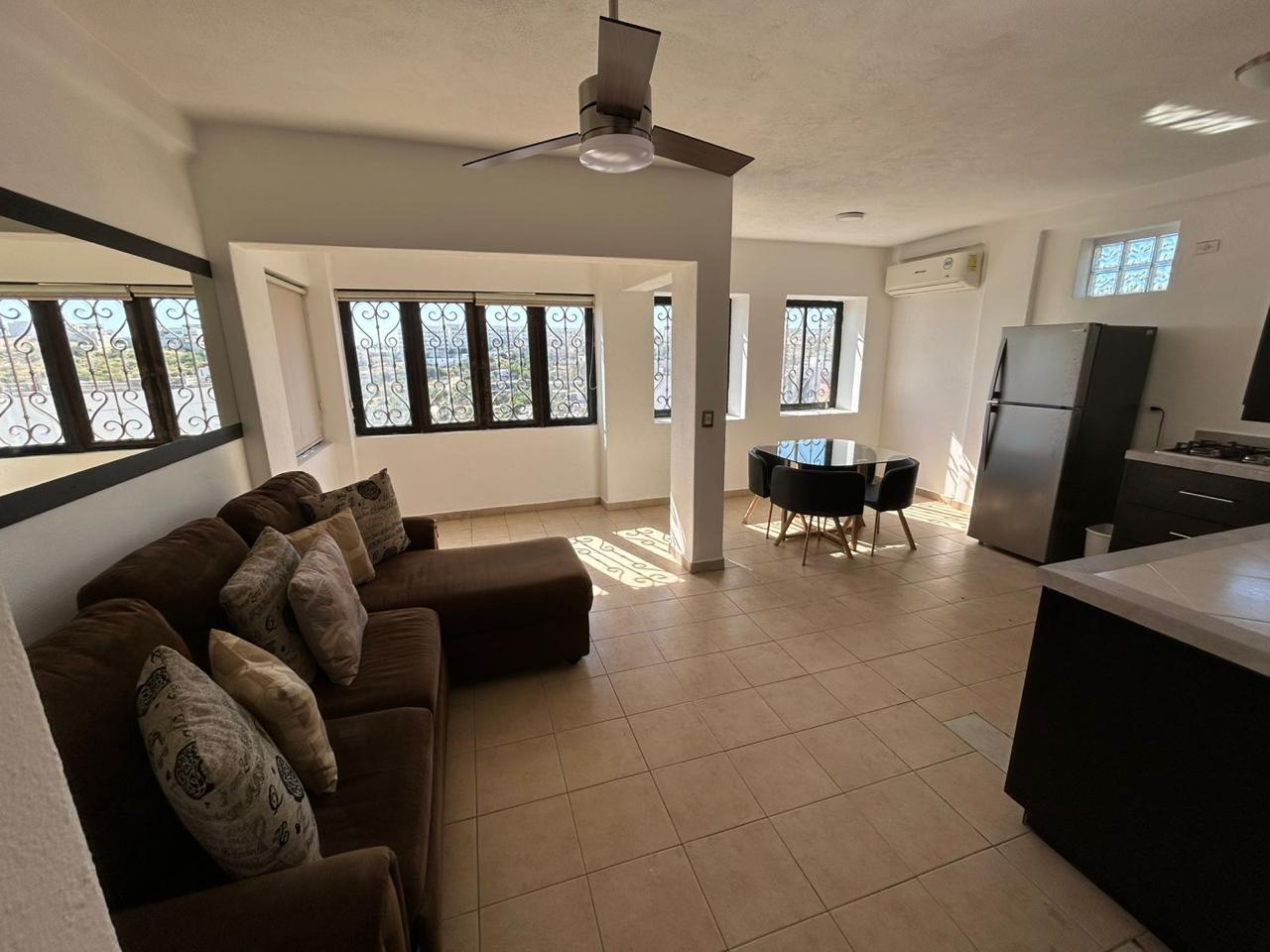 Los Cabos Ventanas Charming Penthouse located within the community of Ventanas del Cortés, situated in El Tezal, Cabo San Lucas. This 2-bedroom, 2-bath condo offers a rooftop with incredible for sale