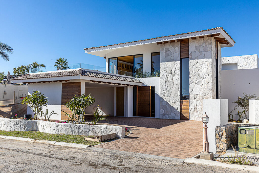 Los Cabos Cabo Colorado Discover modern luxury in this exquisitely designed home, built in 2020 and nestled within the exclusive, beachfront, private gated community of Cabo Colorado in San José del Cabo—just 2 miles from Palmilla Beach. Enjoy the convenience of living just steps from a stunning, sandy private beach within the community.With a striking contemporary aesthetic, this residence features gleaming white marble floors, beautifully appointed marble bathrooms, and captivating ocean – Rancho Paraiso, Cabo Corridor, BS