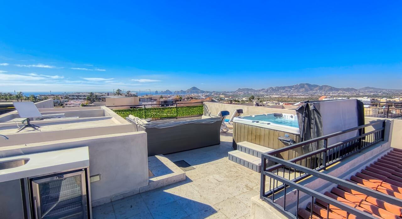 Los Cabos Club La Costa This beautiful corner Penthouse is located in the highly desirable Club La Costa Phase 3 community and comes fully furnished. its prime location allow you to walk to the beach, supermarket, and a variety of restaurants all just steps away. The main floor features two full bathrooms and an open -plan living and dining area with a modern kitchen. Large sliding doors lead to a spacious terrace overlooking the golf course, perfect for relaxing or entertaining. A convenient storage room is also located on this level. Upstairs, you'll find two generously sized bedrooms and two full bathrooms. The master suite includes a large private terrace with stunning golf course for sale