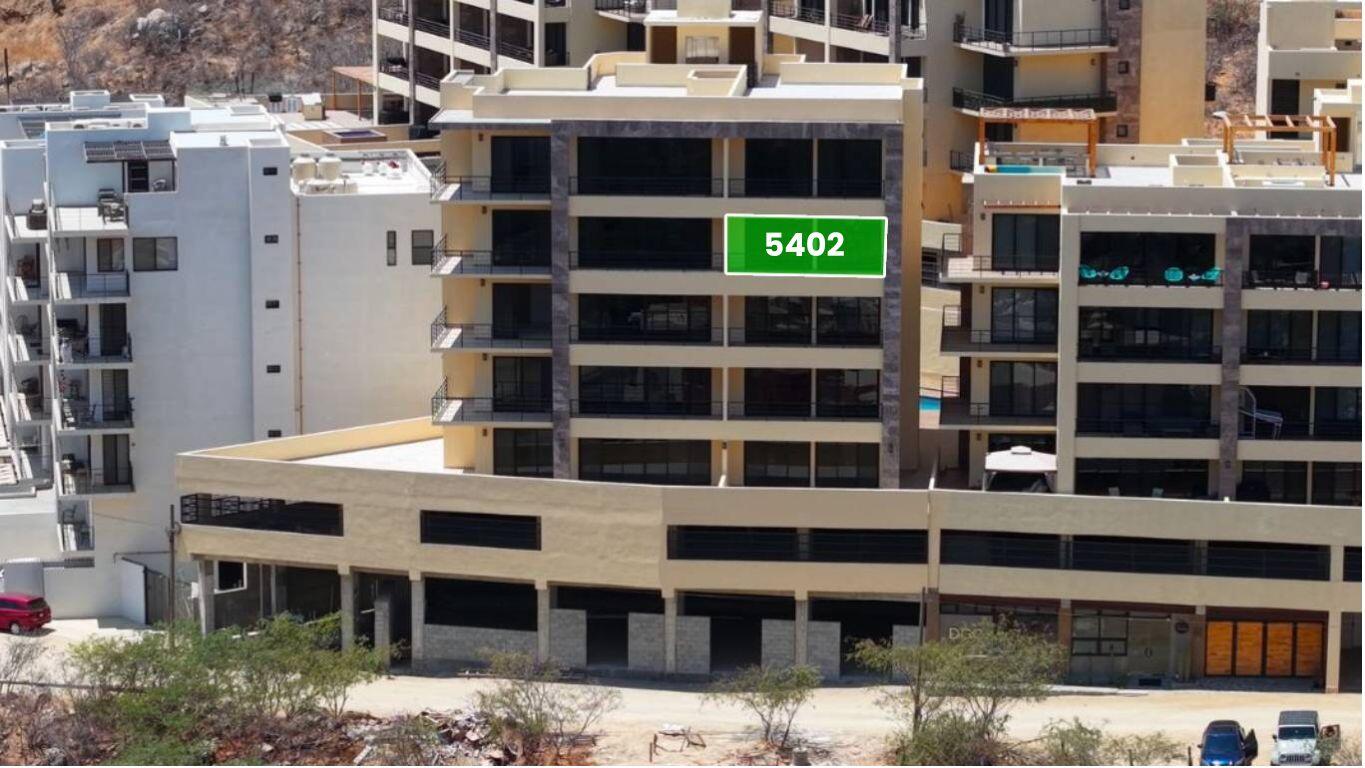 Los Cabos Vista Mare Condo for sale at Vista Mare, Cabo San Lucas, located on the fourth floor within a private residential community in the Sunset area. Its strategic location offers a peaceful setting just minutes from downtown, the Marina, restaurants, cafés, supermarkets, shopping, services, and entertainment. The unit offers 111.15 m² total, including 97.65 m² of air-conditioned interior space and a 13.5 m² private terrace. It features 2 bedrooms, 2 full bathrooms, an open living and dining area, equipped kitchen, A/C, and 1 underground parking space. Amenities include 2 pools, gym, jacuzzi, firepit, and social areas. Ready for delivery. Price: for sale